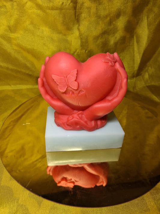 Holding Heart Shaped Scented Candle
