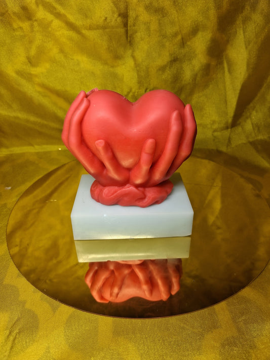 Holding Heart Shaped Scented Candle